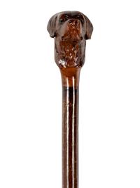 Two Figural Walking Sticks or Canes