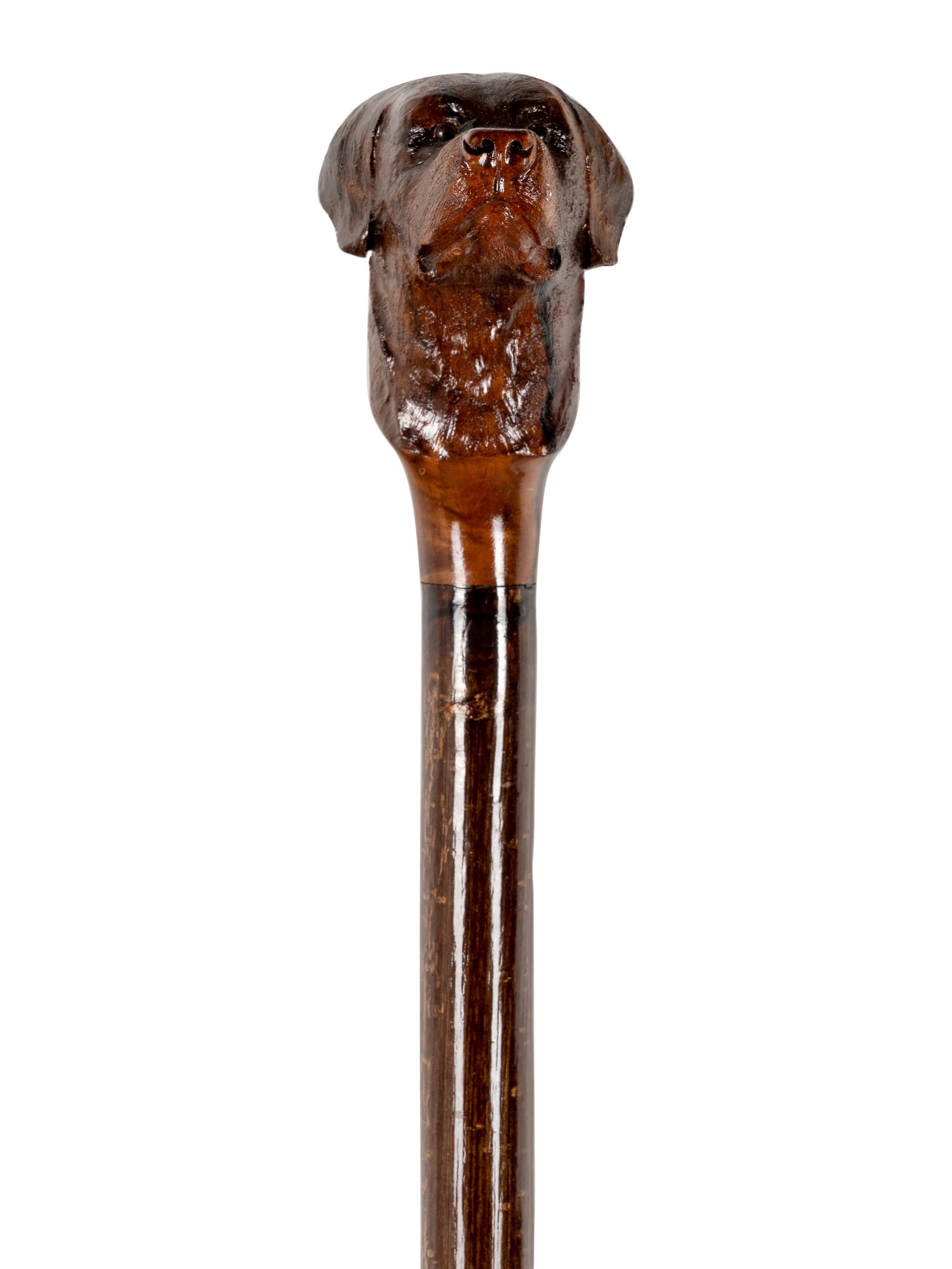 Two Figural Walking Sticks or Canes