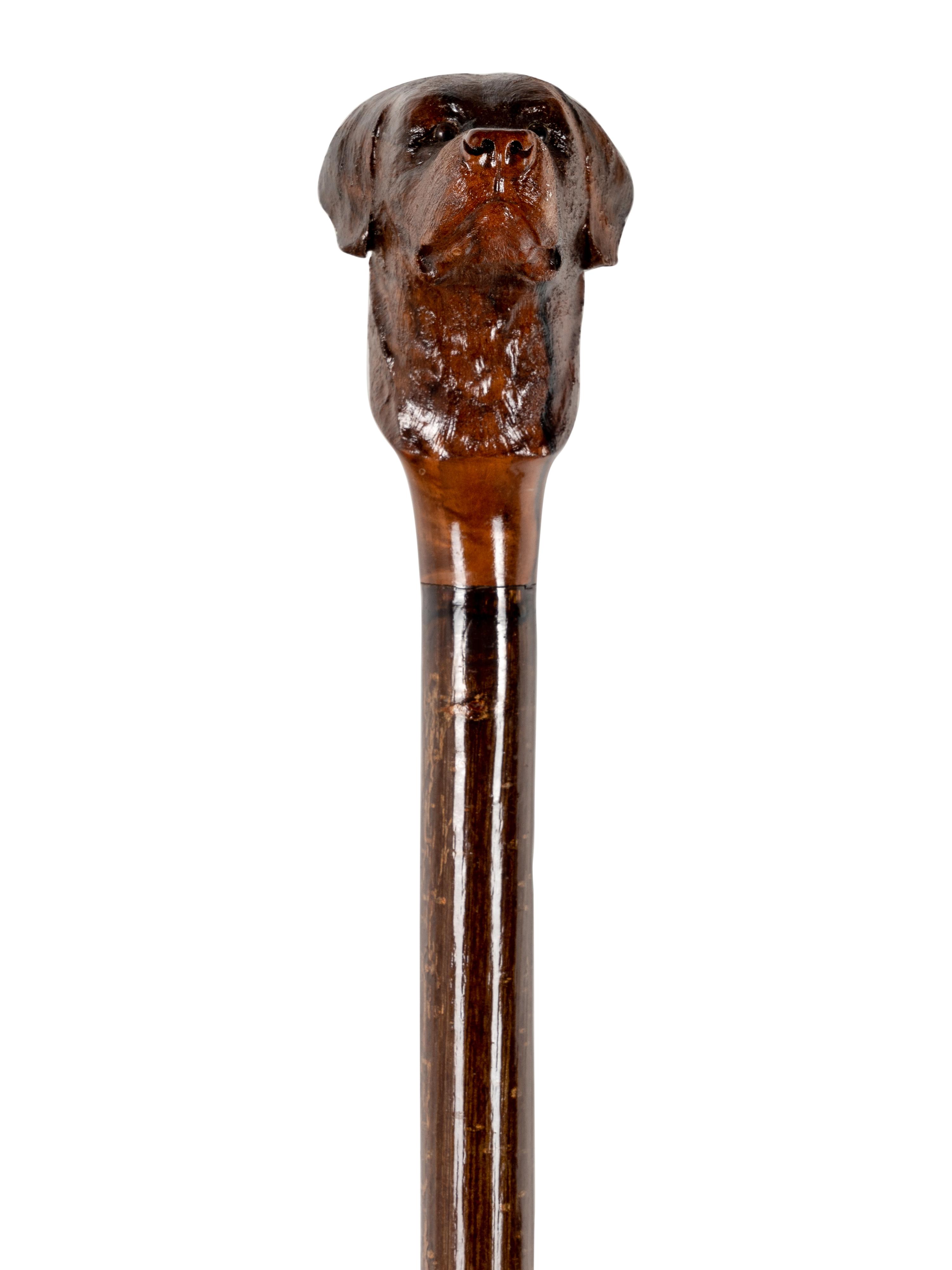Two Figural Walking Sticks or Canes