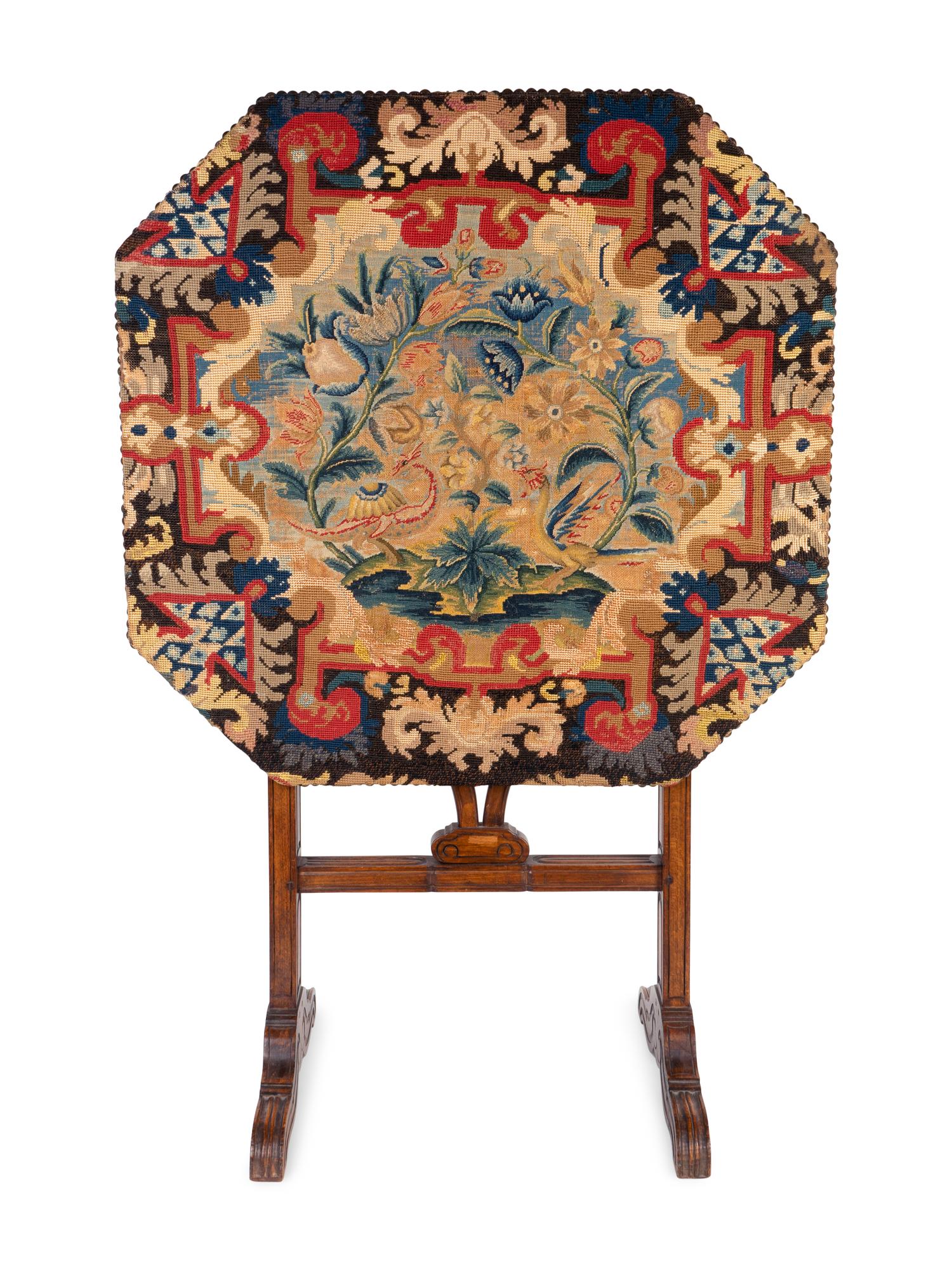 A Victorian Needlepoint-Mounted Tilt-Top Coaching Table — 19TH/20TH CENTURY