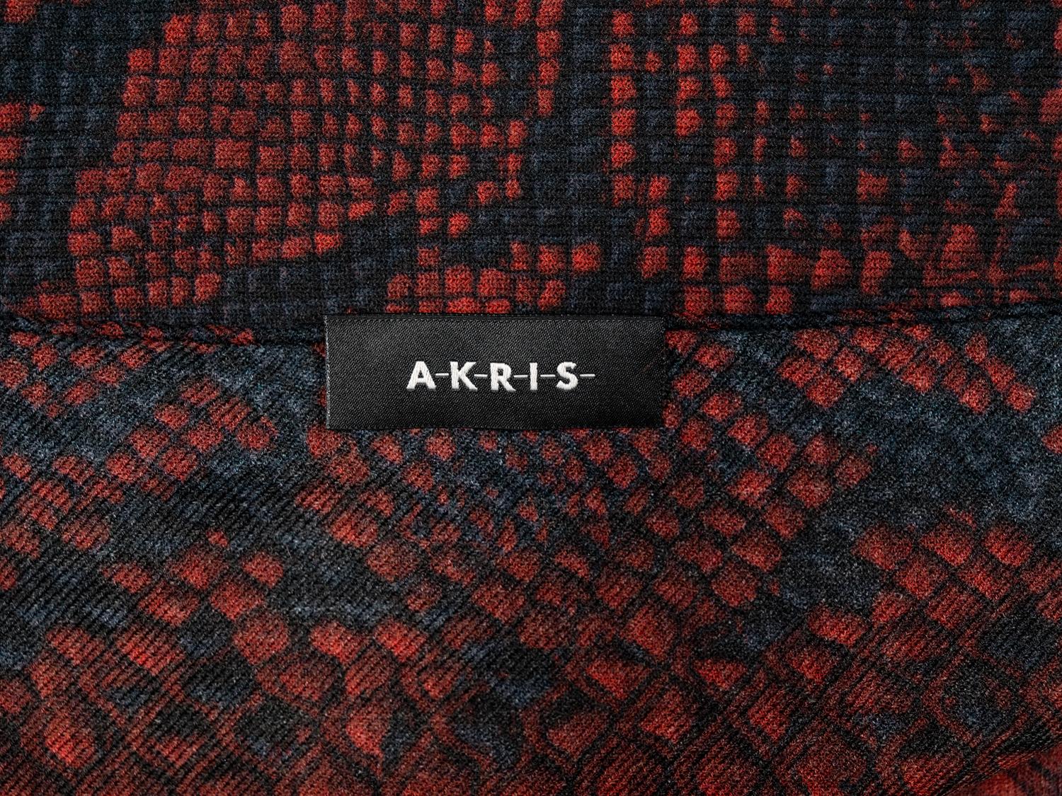 Seven Designer Scarves: One Brunello Cucinelli, Two Eskandar, One Akris, One Hermès, One Loro Piana, One Yves Saint Laurent Rive Gauche