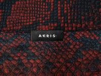 Seven Designer Scarves: One Brunello Cucinelli, Two Eskandar, One Akris, One Hermès, One Loro Piana, One Yves Saint Laurent Rive Gauche