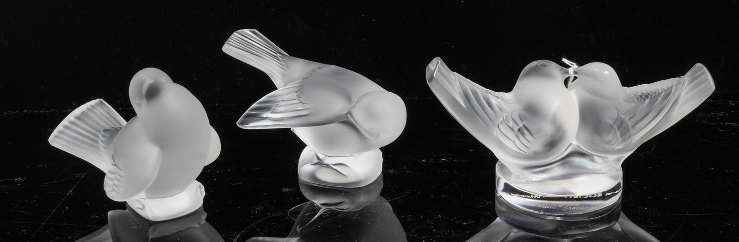 A Group of Three Lalique Frosted Glass Figures Height of tallest 3 1/8 inches.