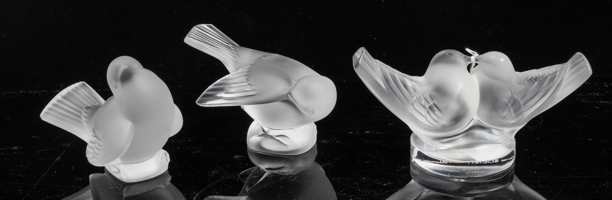 A Group of Three Lalique Frosted Glass Figures Height of tallest 3 1/8 inches.