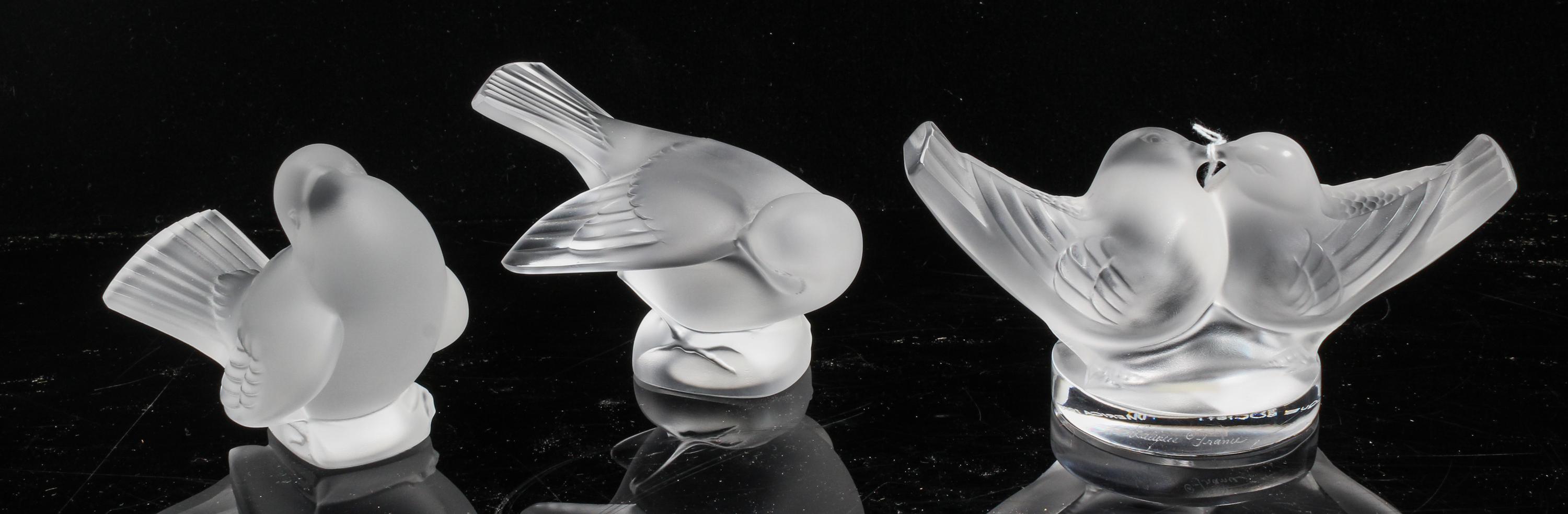 A Group of Three Lalique Frosted Glass Figures Height of tallest 3 1/8 inches.