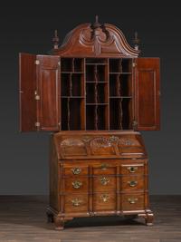 A Kindel Chippendale Revival Shell-and-Block Front Desk-and-Bookcase