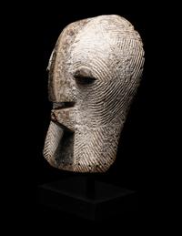A Songye Wood Female Mask (Kifwebe)