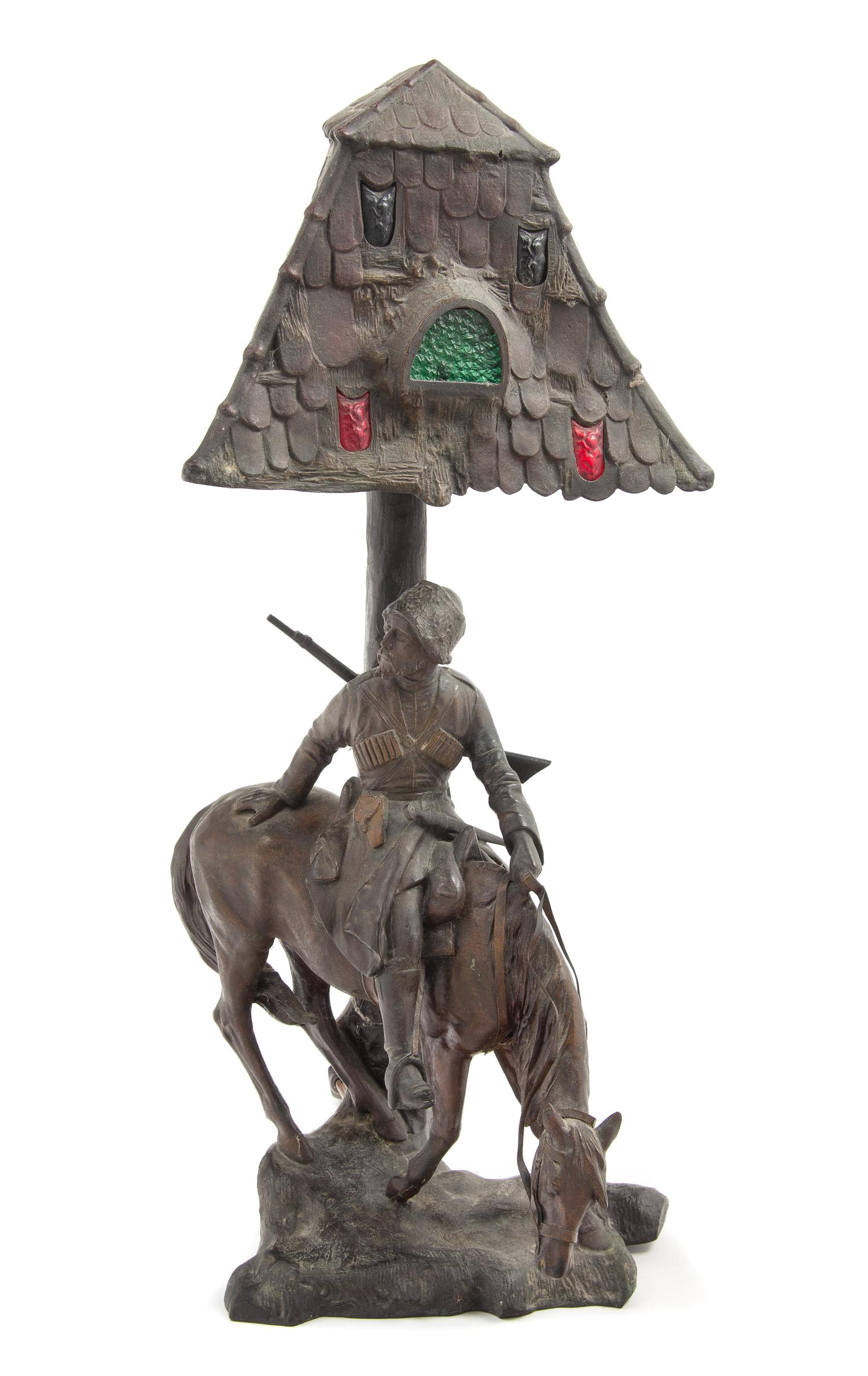 A German Cast Metal Figural Lamp Height 25 inches. — EARLY 20TH CENTURY