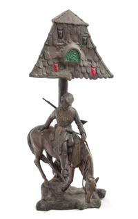 A German Cast Metal Figural Lamp Height 25 inches. — EARLY 20TH CENTURY