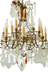 A Louis XV Style Gilt Bronze and Cut Glass Twelve-Light Chandelier