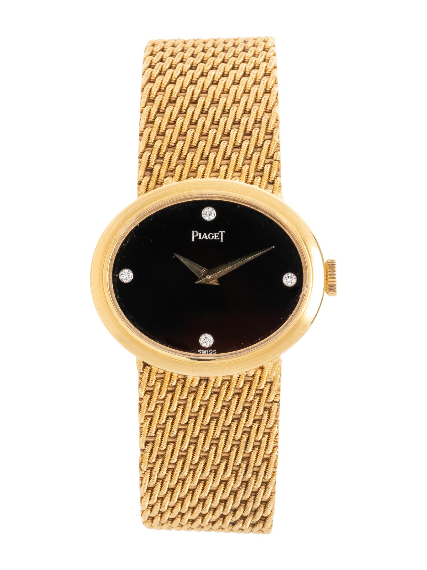 PIAGET, 18K YELLOW GOLD, DIAMOND AND ONYX WATCH