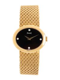 PIAGET, 18K YELLOW GOLD, DIAMOND AND ONYX WATCH