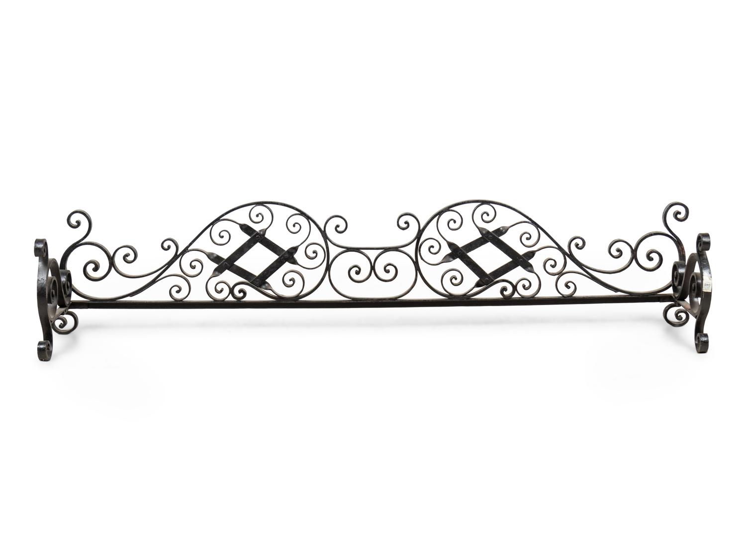 A Wrought Iron Fireplace Fender