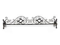 A Wrought Iron Fireplace Fender