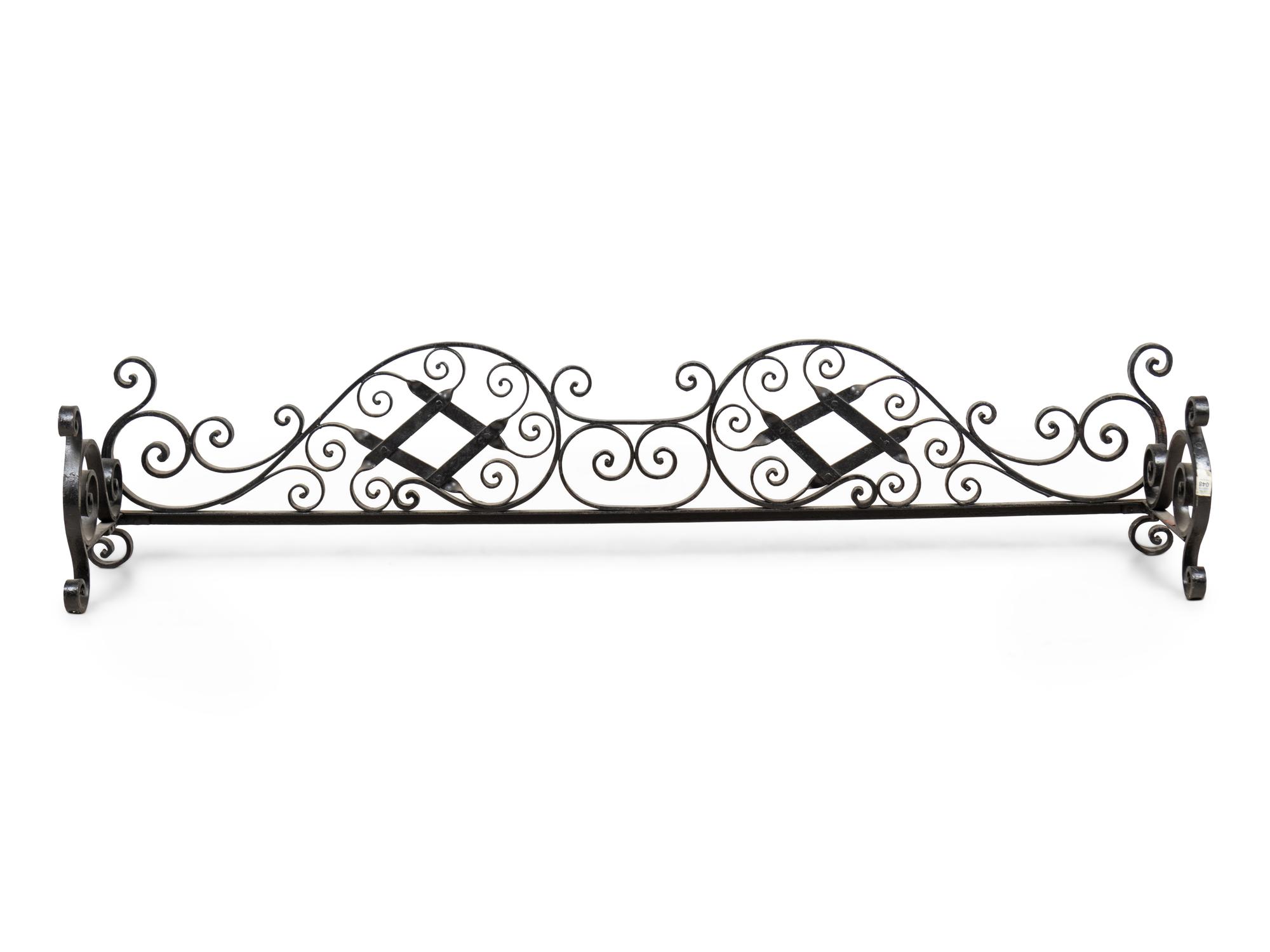 A Wrought Iron Fireplace Fender