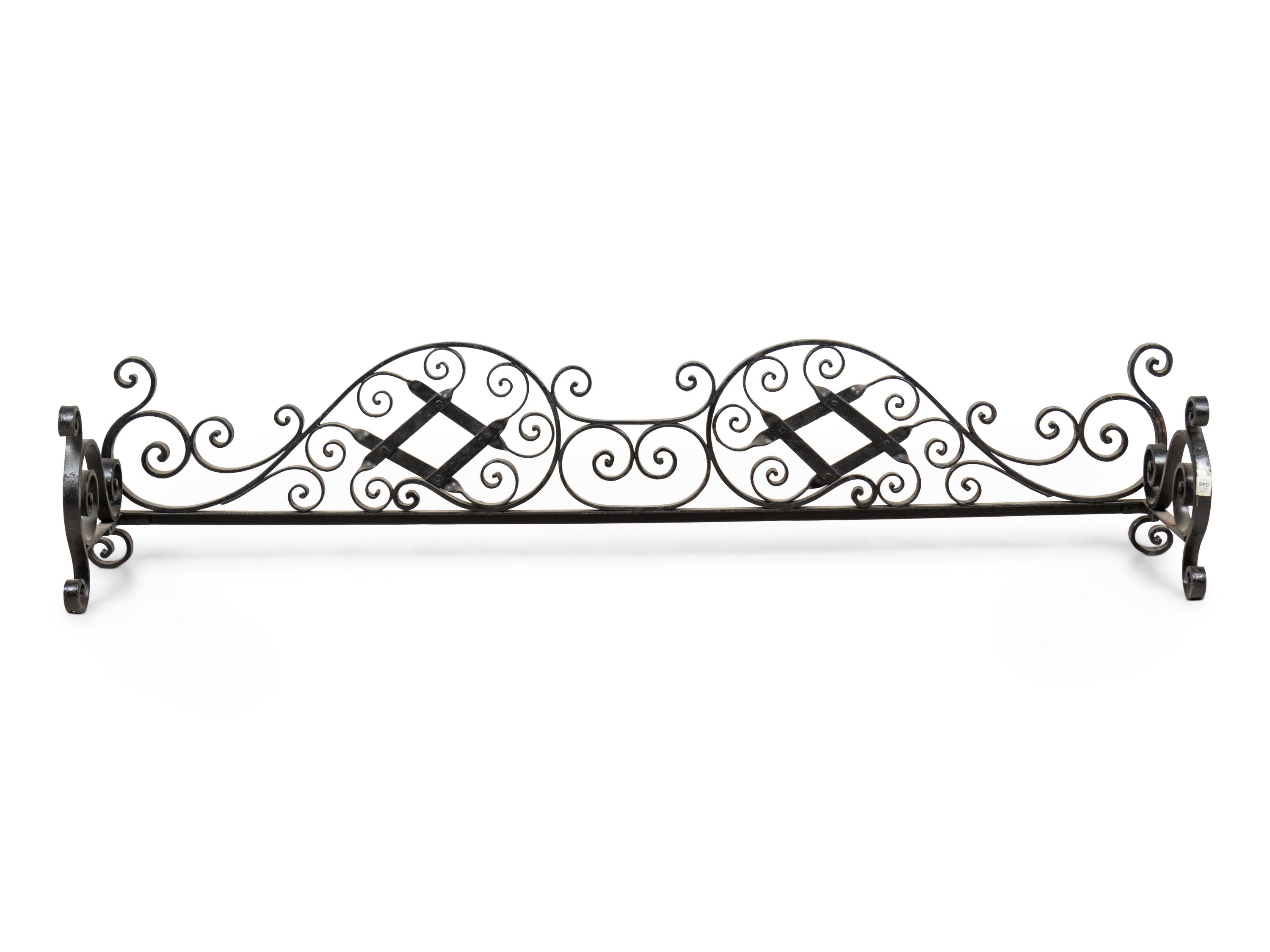 A Wrought Iron Fireplace Fender