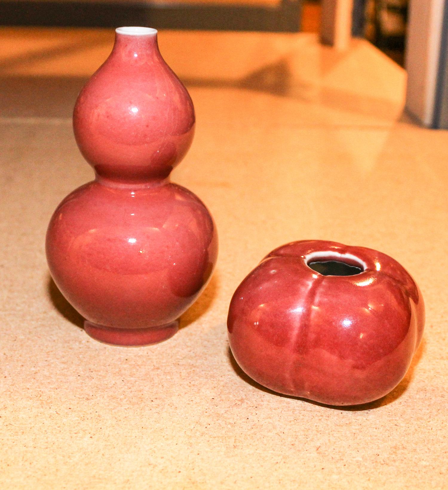 Two Red Glazed Porcelain Articles Height of taller 6 inches.