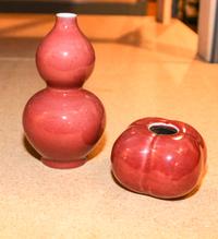Two Red Glazed Porcelain Articles Height of taller 6 inches.