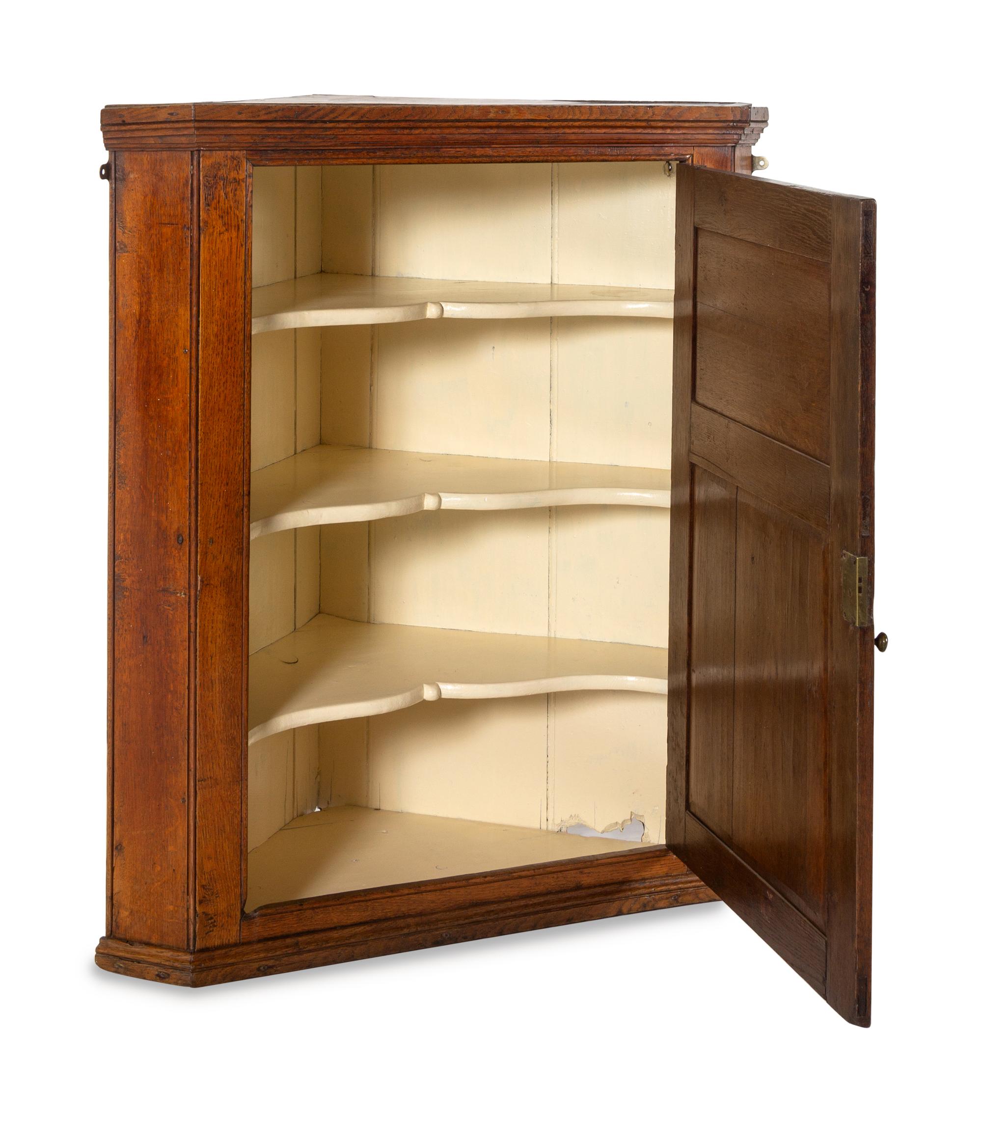 A George III Oak Hanging Corner Cupboard