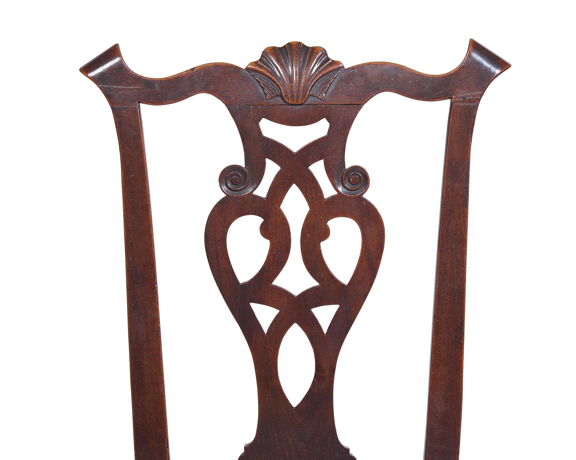 A Pair of Chippendale Carved Walnut Side Chairs
