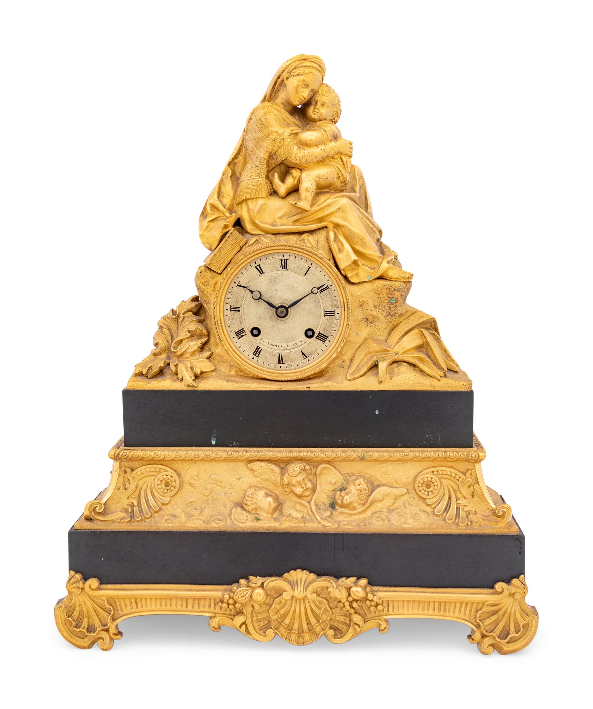 A Napoleon III Style Gilt Metal Figural Mantel Clock