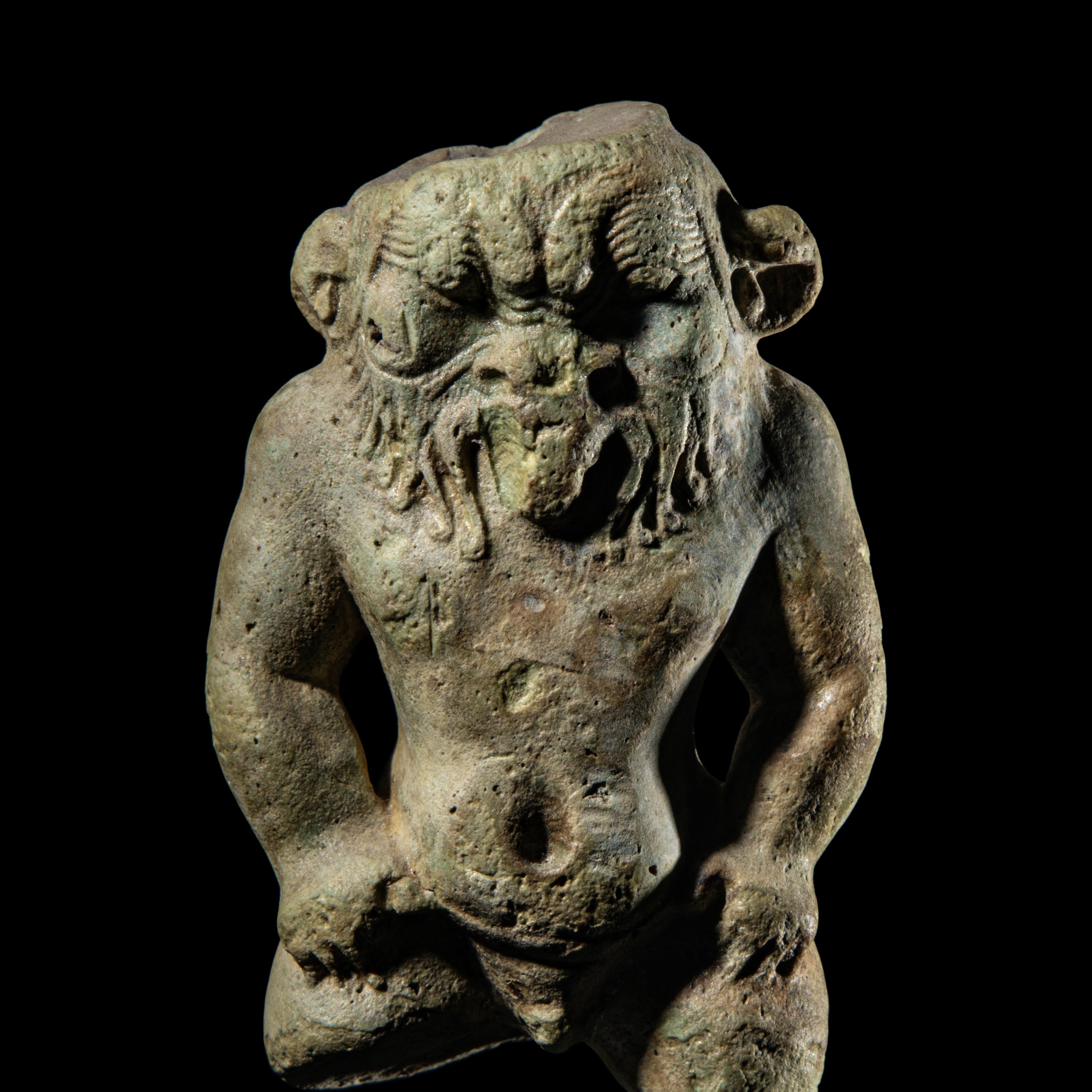 An Egyptian Faience Bes