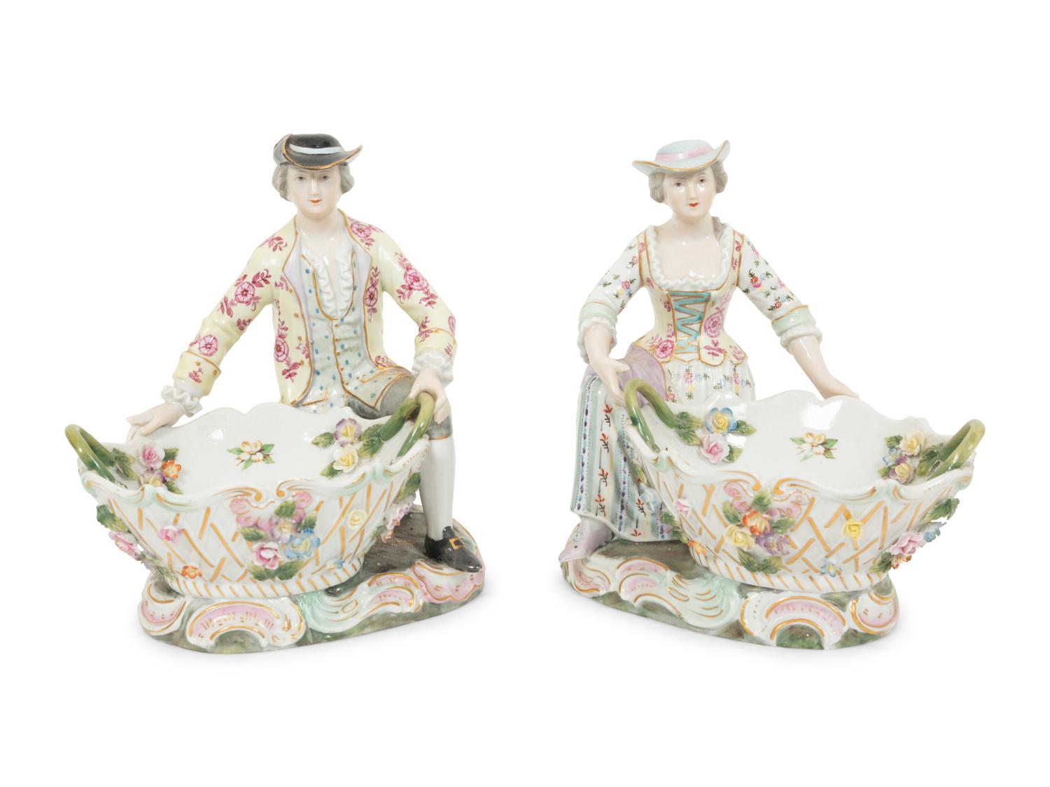 A Pair of Dresden Porcelain Figural Sweetmeat Dishes