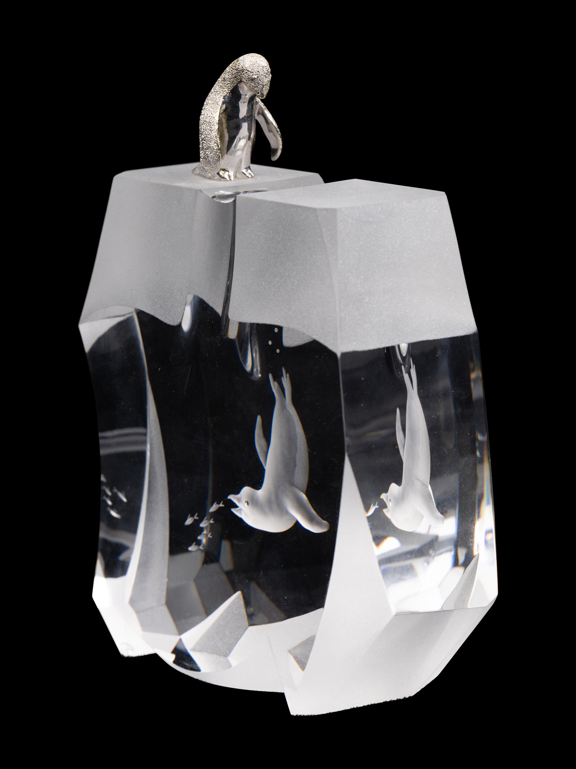 A Steuben Glass and Silver Ice Hunter Sculpture