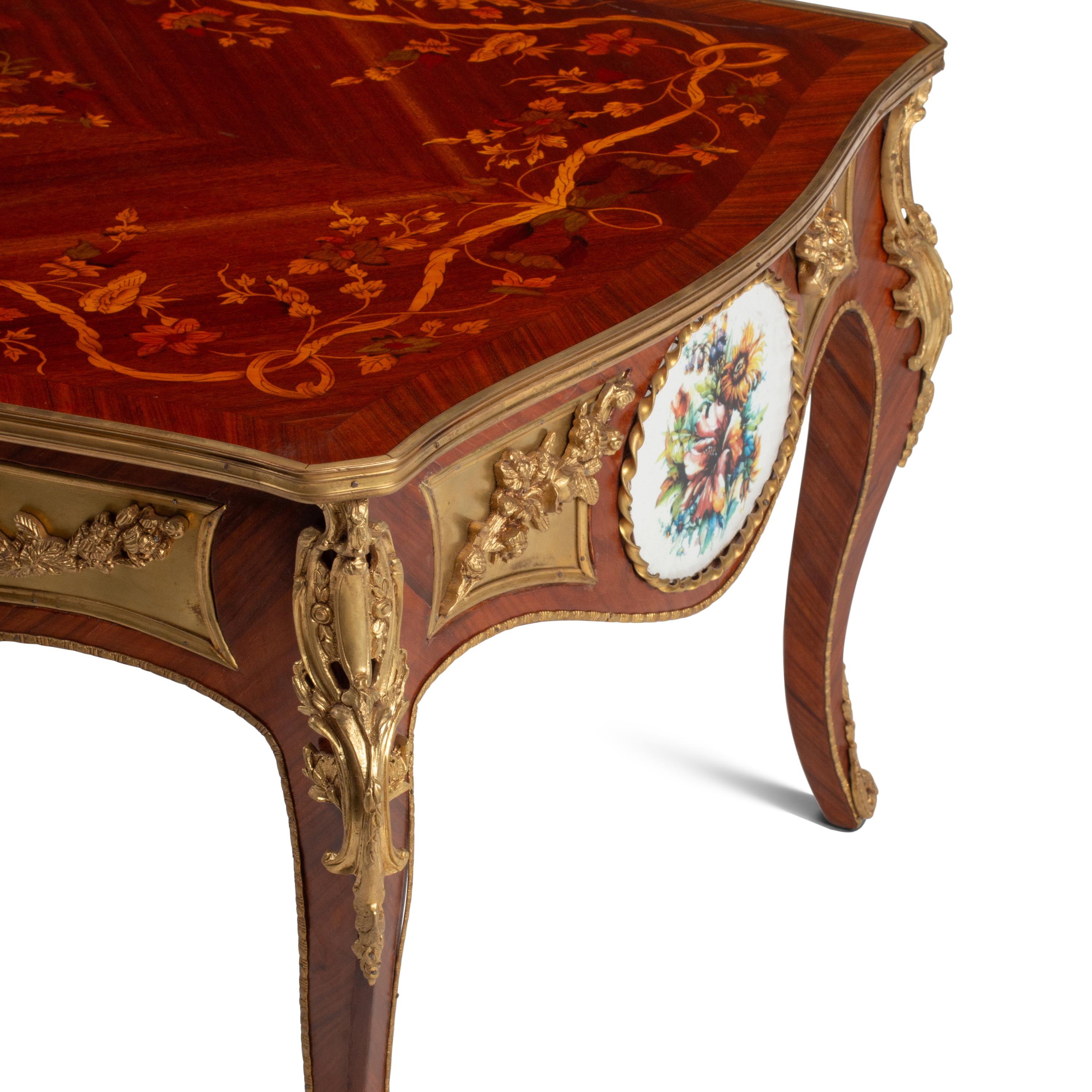 A Louis XV Style Gilt Bronze Mounted Marquetry Low Table