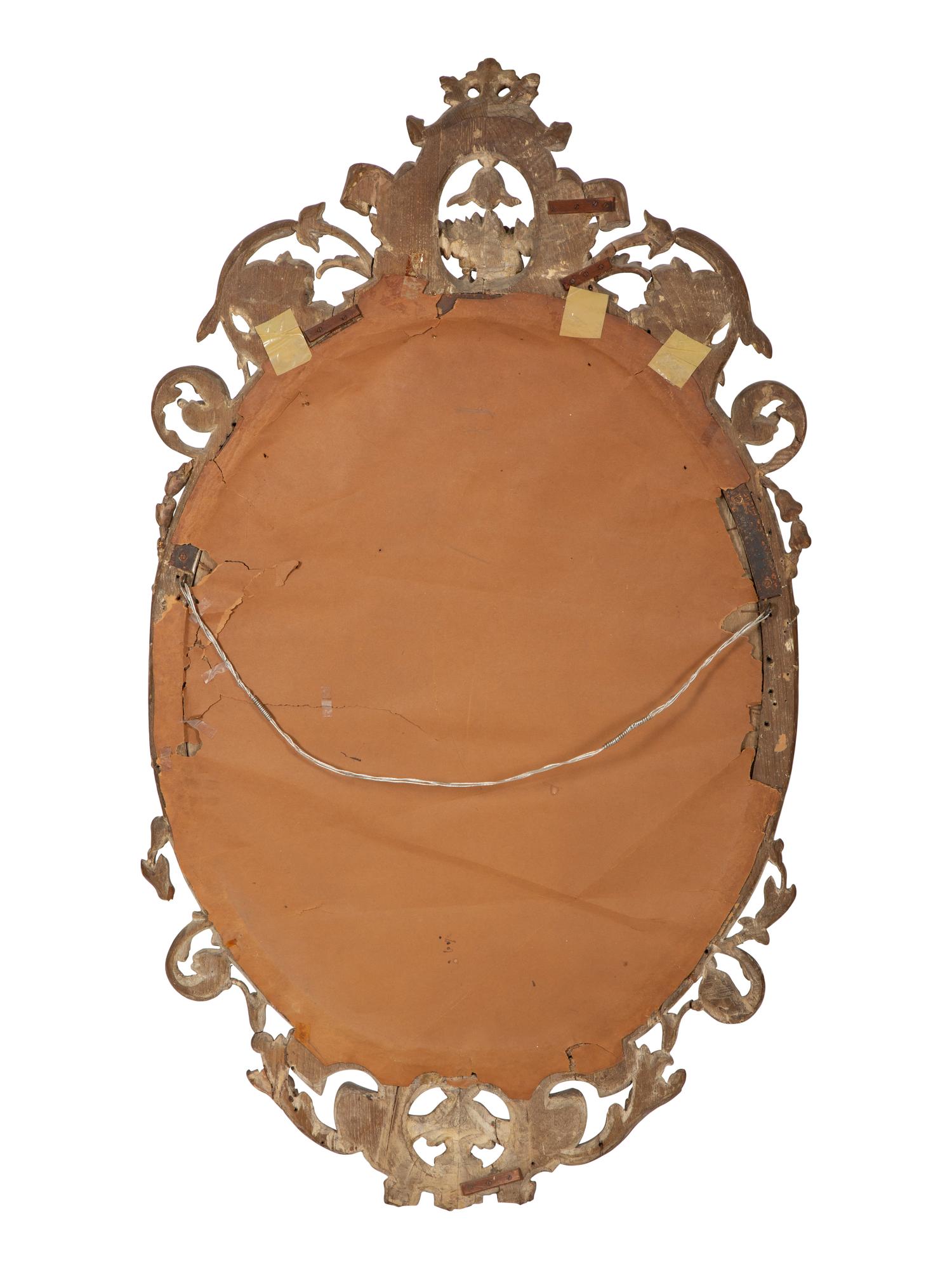 An Italian Baroque Style Carved Walnut Mirror