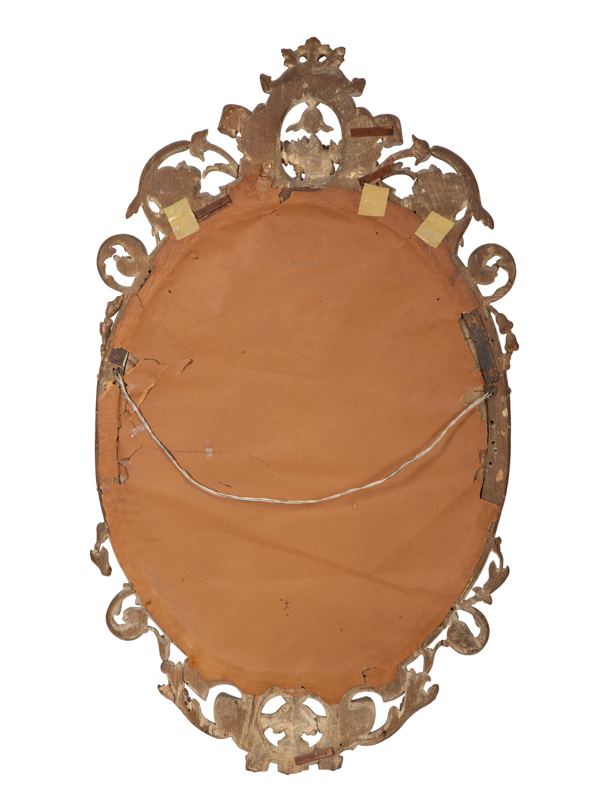 An Italian Baroque Style Carved Walnut Mirror