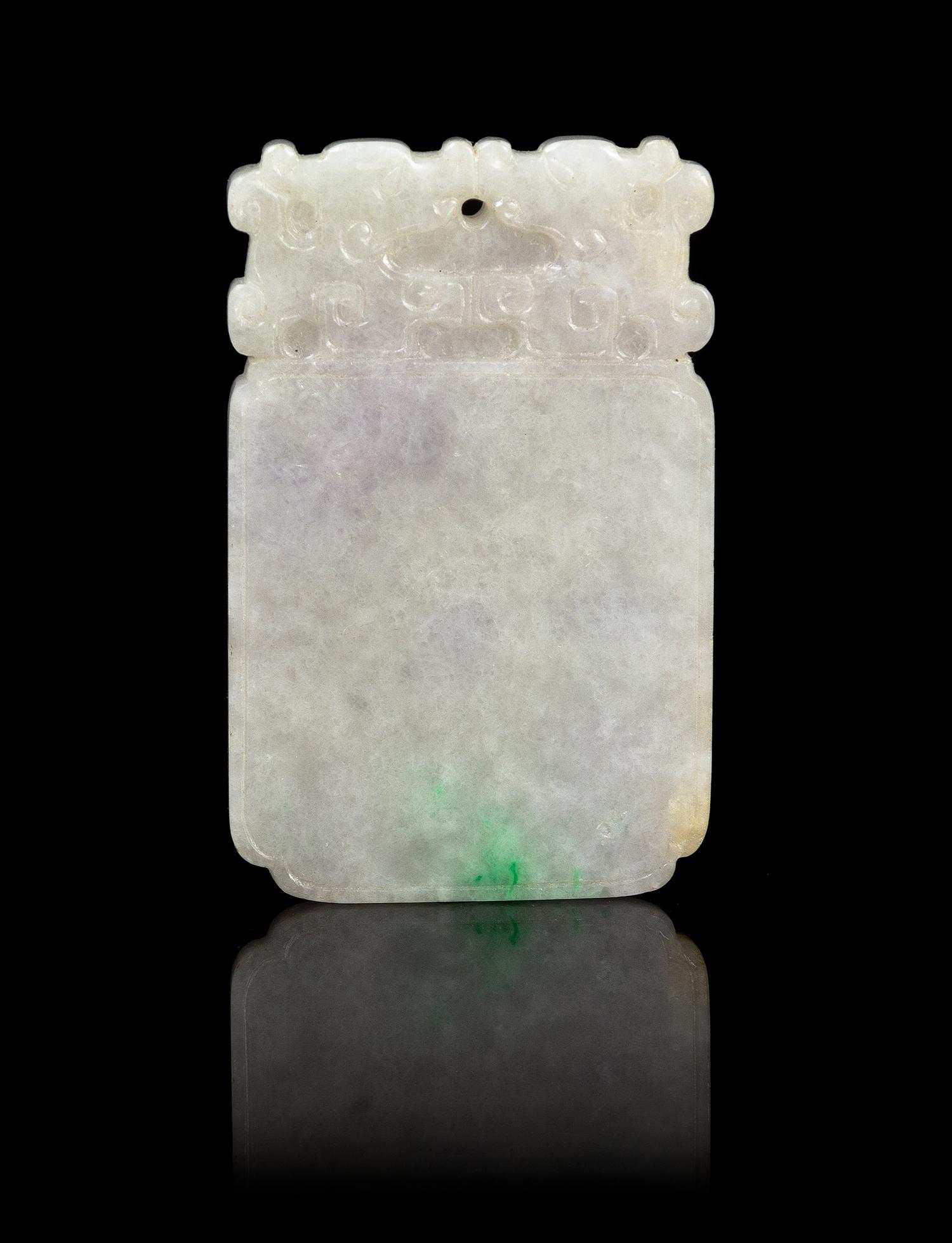 A Chinese Jadeite Plaque REPUBLIC PERIOD, EARLY 20TH CENTURY Height 2 5/8 x width 1 5/8 x thickness 1/4 inches. — REPUBLIC PERIOD, EARLY 20TH CENTURY