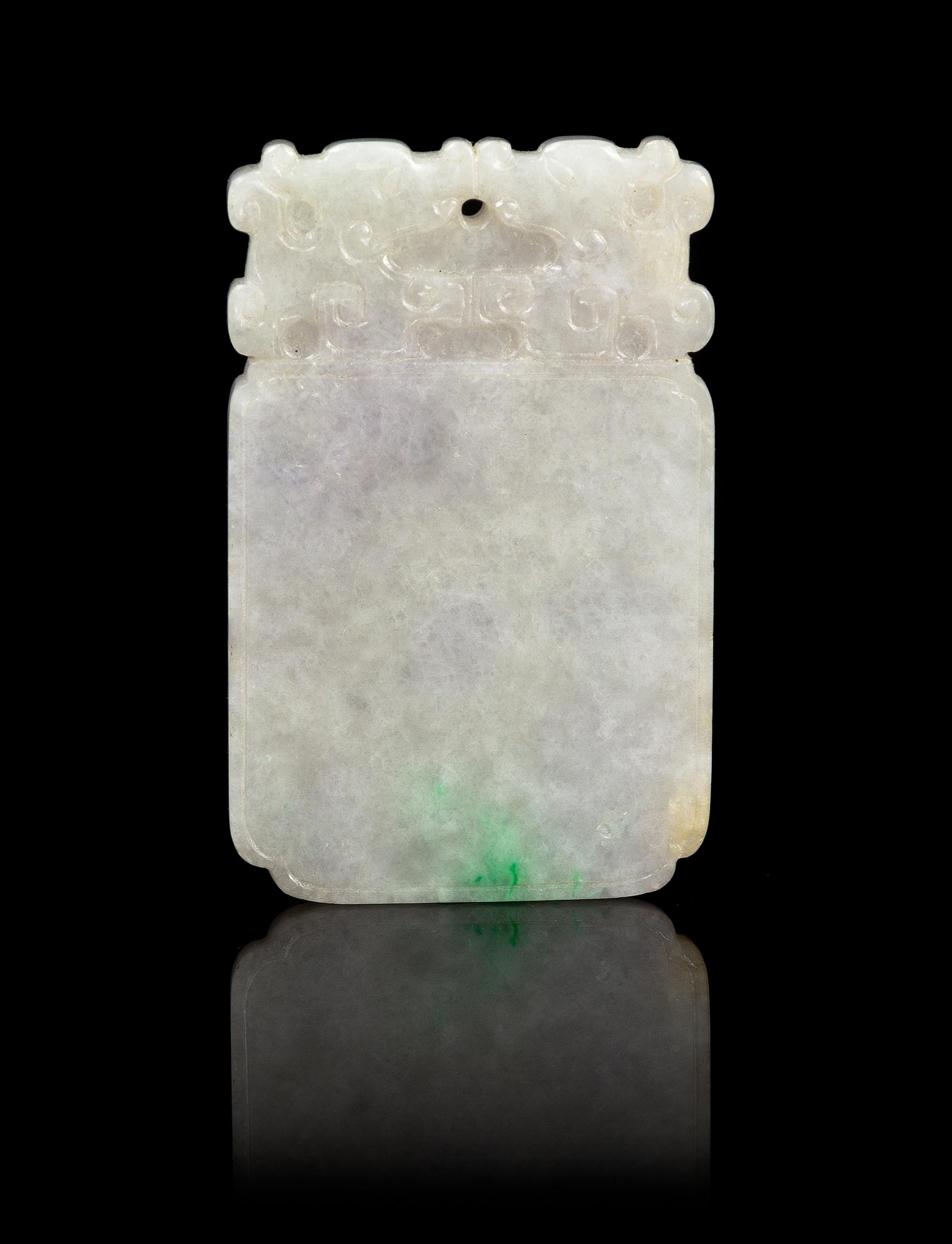 A Chinese Jadeite Plaque REPUBLIC PERIOD, EARLY 20TH CENTURY Height 2 5/8 x width 1 5/8 x thickness 1/4 inches. — REPUBLIC PERIOD, EARLY 20TH CENTURY