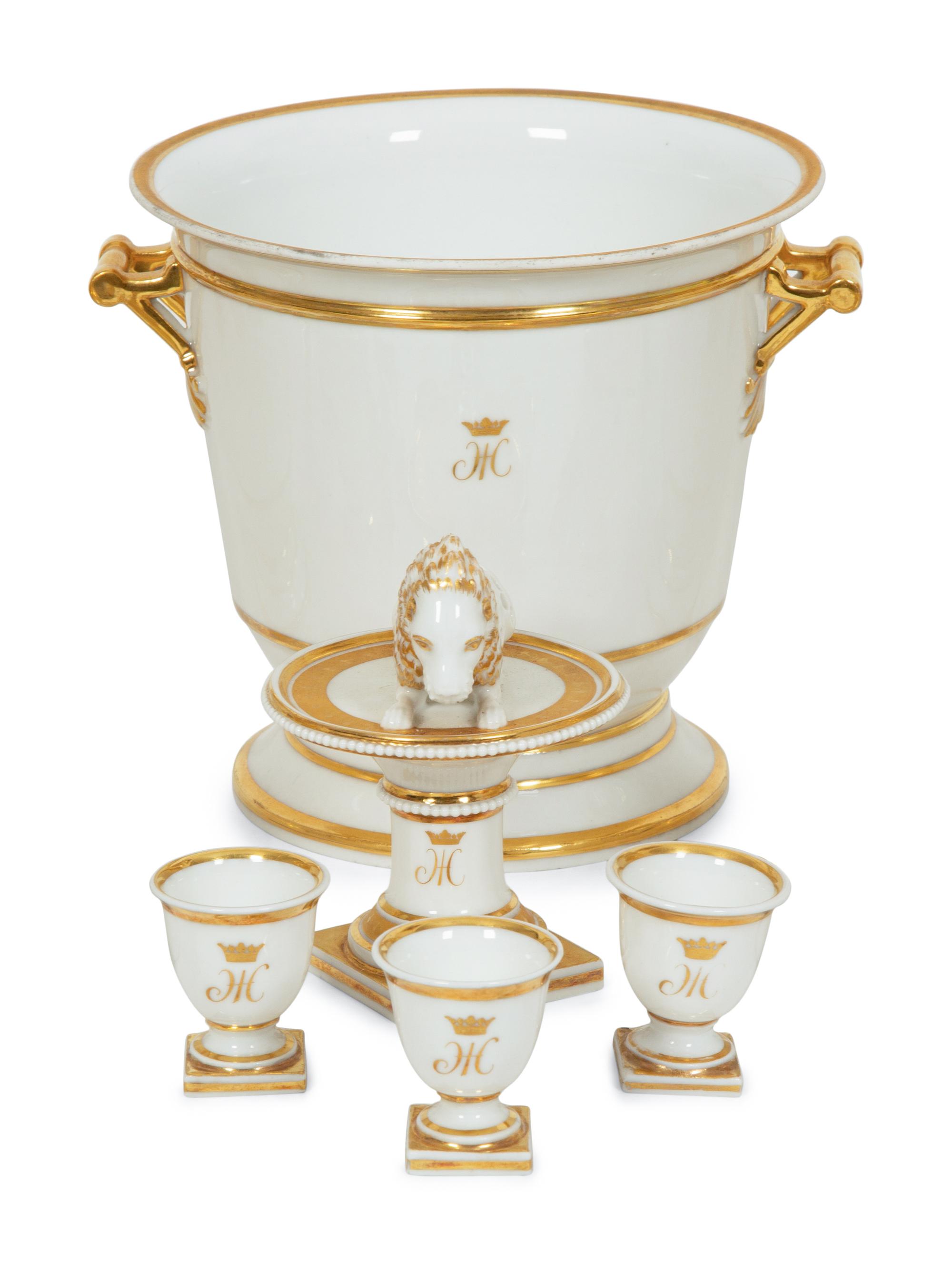 A Continental Gilt Decorated Porcelain Dessert Service