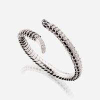 An eighteen karat white gold, diamond, and enamel bangle, Roberto Coin