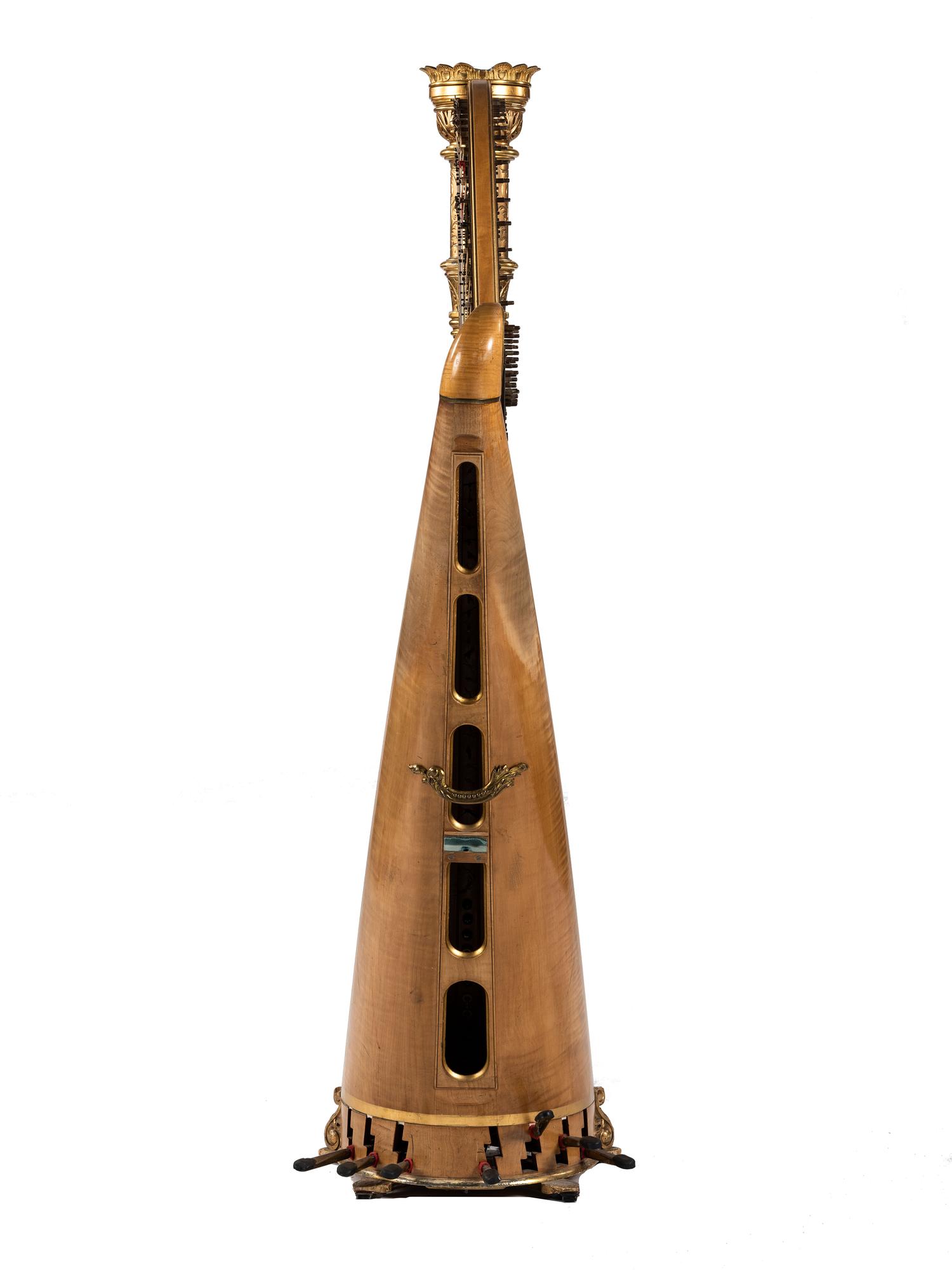 A Lyon & Healy Carved and Parcel Gilt Wood Harp