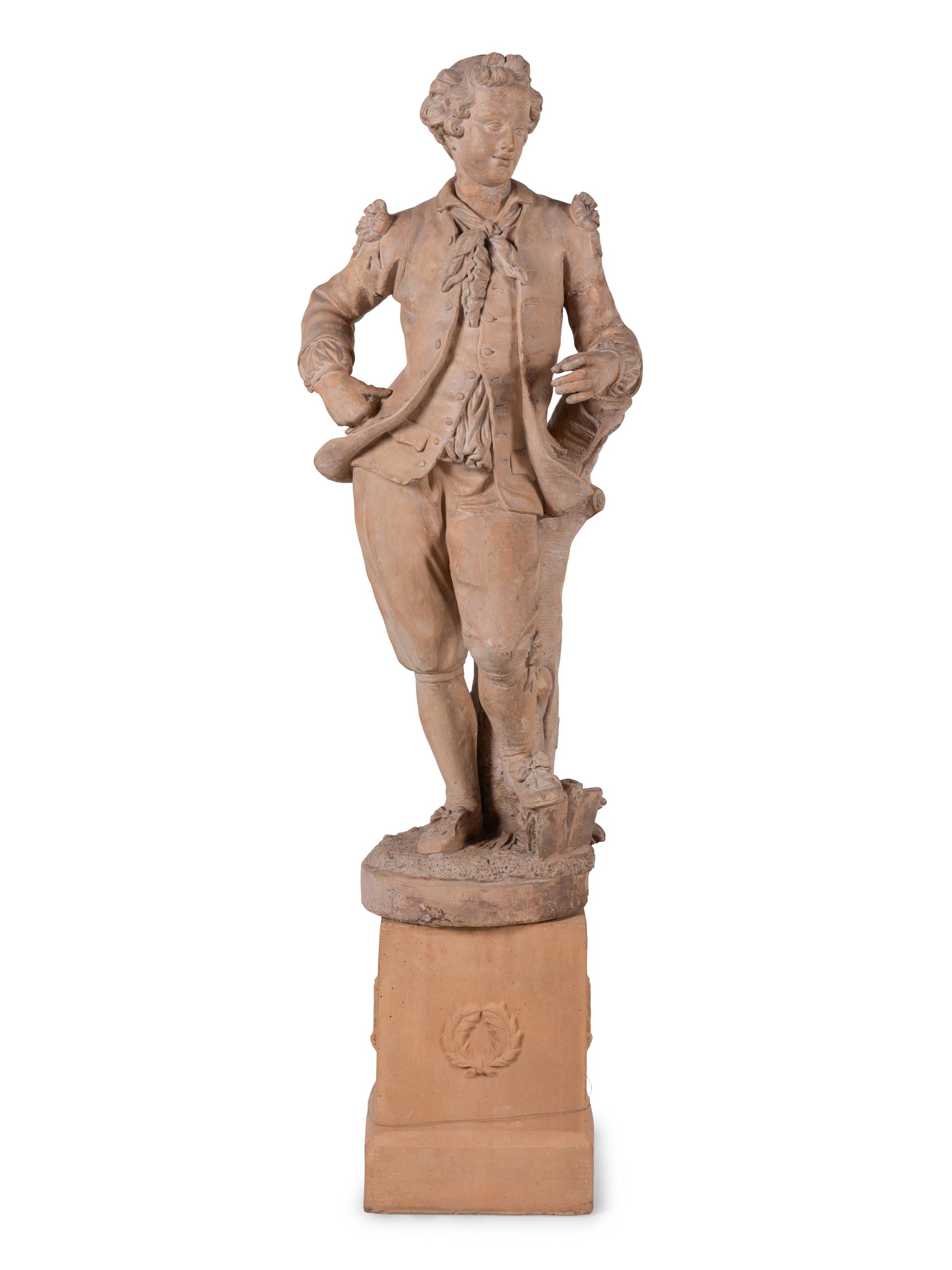 A Continental Terra Cotta Figure