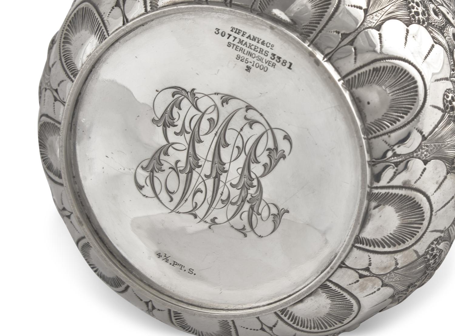 A Sterling Silver Floral Repousse Water Pitcher, Tiffany & Co., New York, NY, Circa 1880