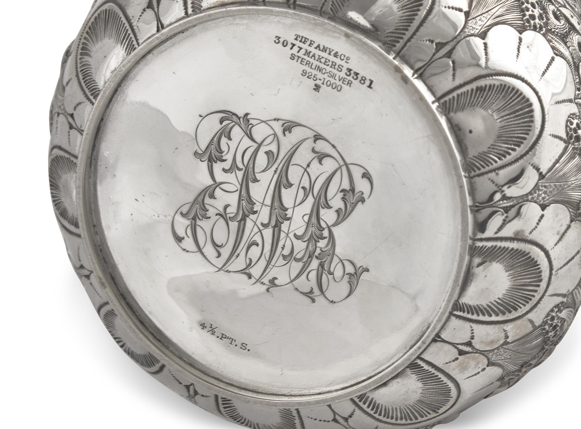 A Sterling Silver Floral Repousse Water Pitcher, Tiffany & Co., New York, NY, Circa 1880