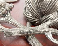 A Pair of Silvered Metal Hunting Trophies