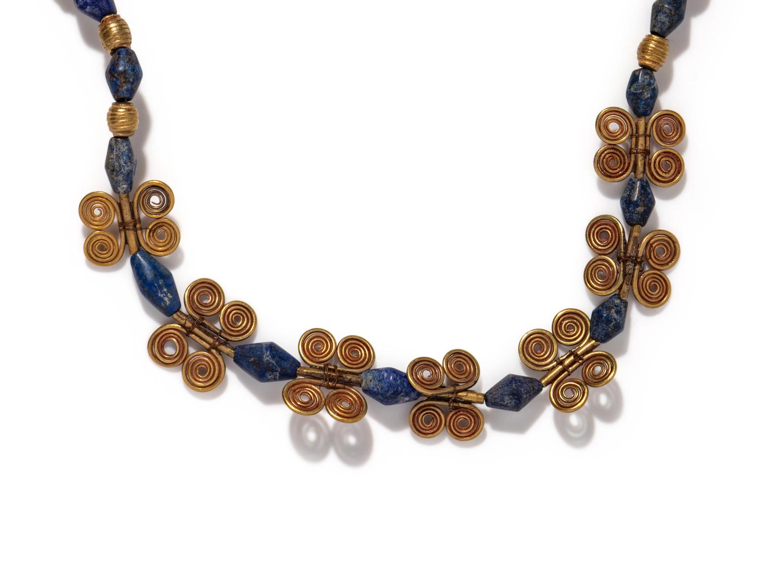 A Western Asiatic Gold and Lapis Lazuli Bead Necklace