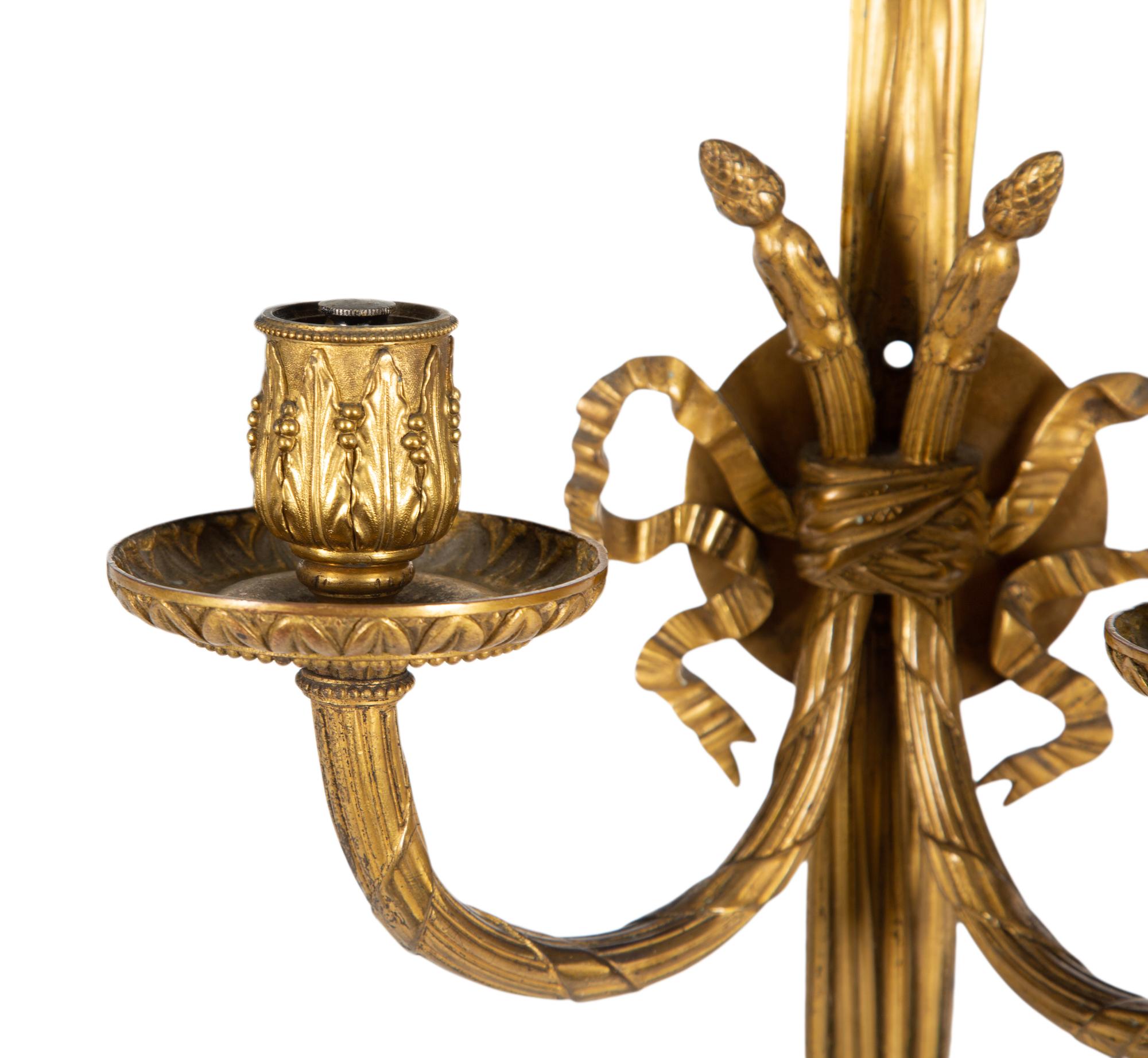 A Pair of Louis XVI Style Gilt Bronze Two-Light Sconces