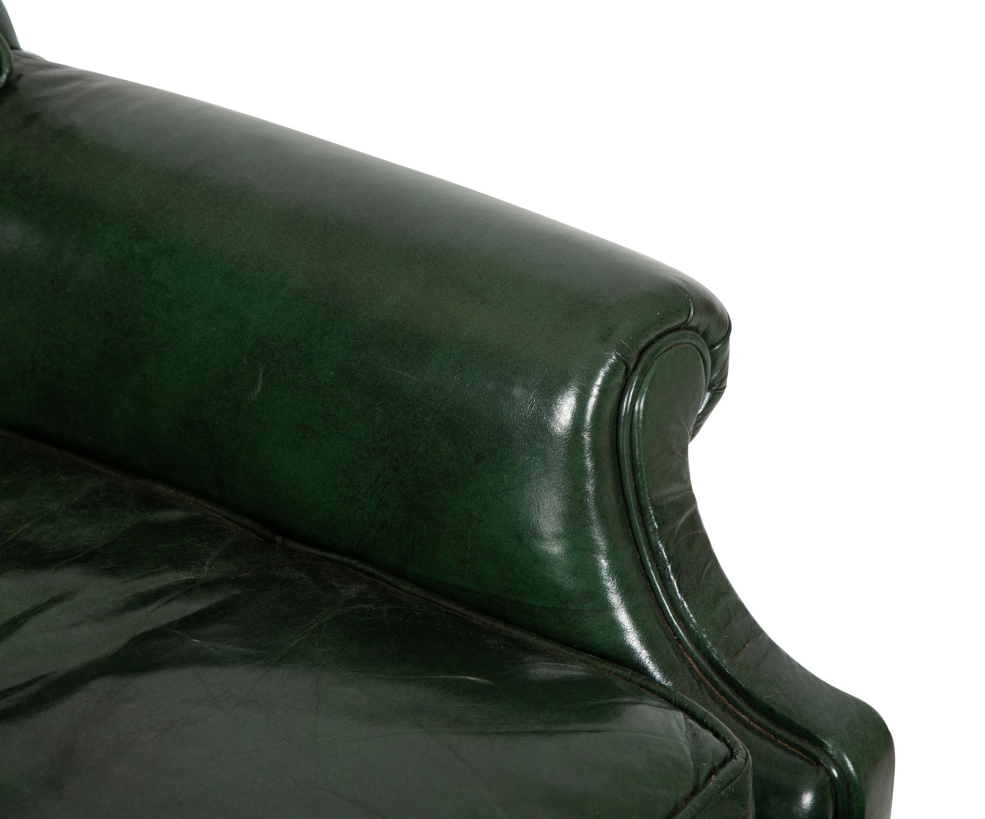 A Green Leather Button Tufted Club Chair and Ottoman — 20th Century