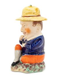 A Staffordshire Figural Tobacco Jar