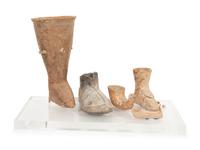 A Group of Earthenware Shoe-Form Drinking Vessels