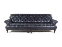 An Oversized Black Leather Upholstered Chesterfield Sofa