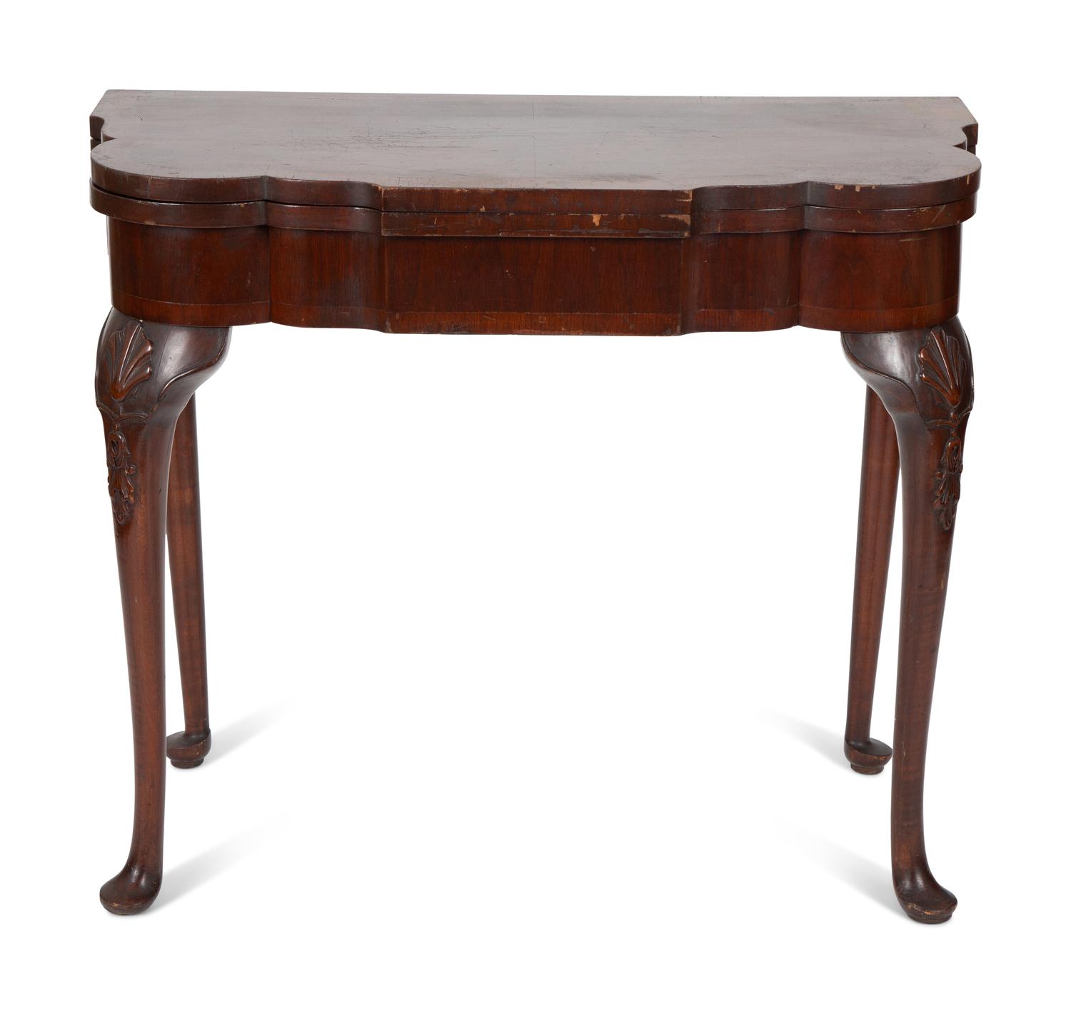 A Queen Anne Style Mahogany Flip Top Table
