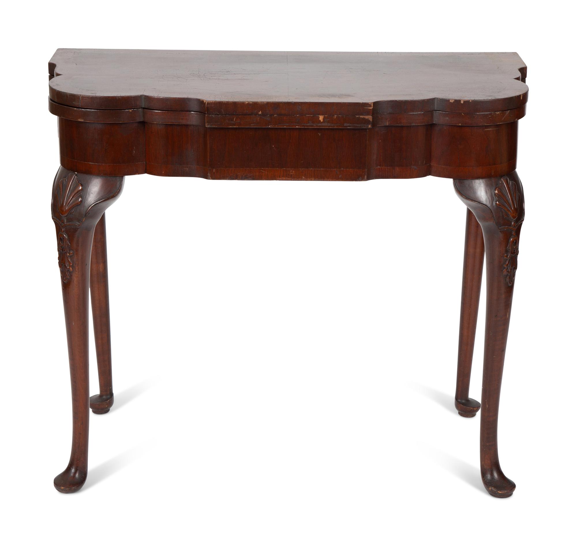 A Queen Anne Style Mahogany Flip Top Table