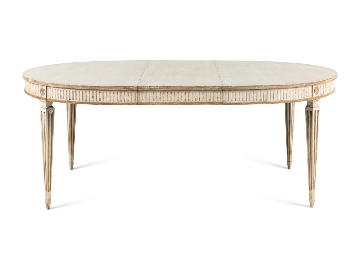 A Dennis and Leen Painted and Parcel-Gilt Dining Suite