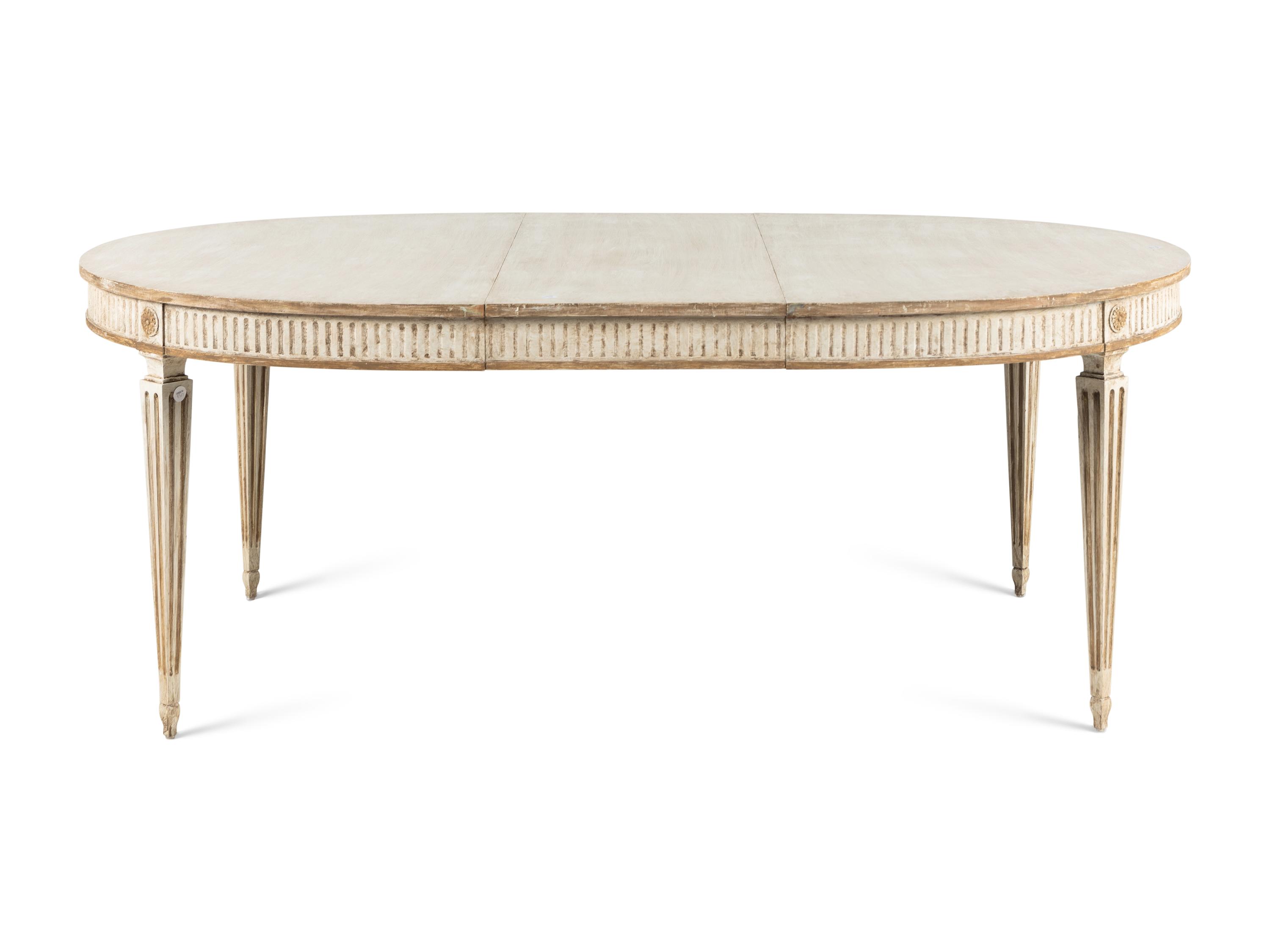 A Dennis and Leen Painted and Parcel-Gilt Dining Suite